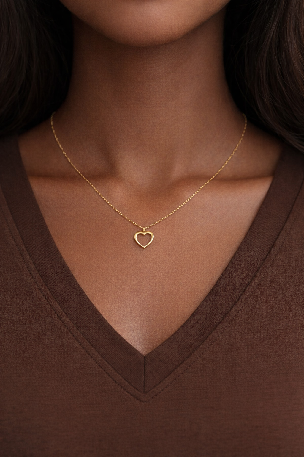 Elegant gold heart pendant close-up
